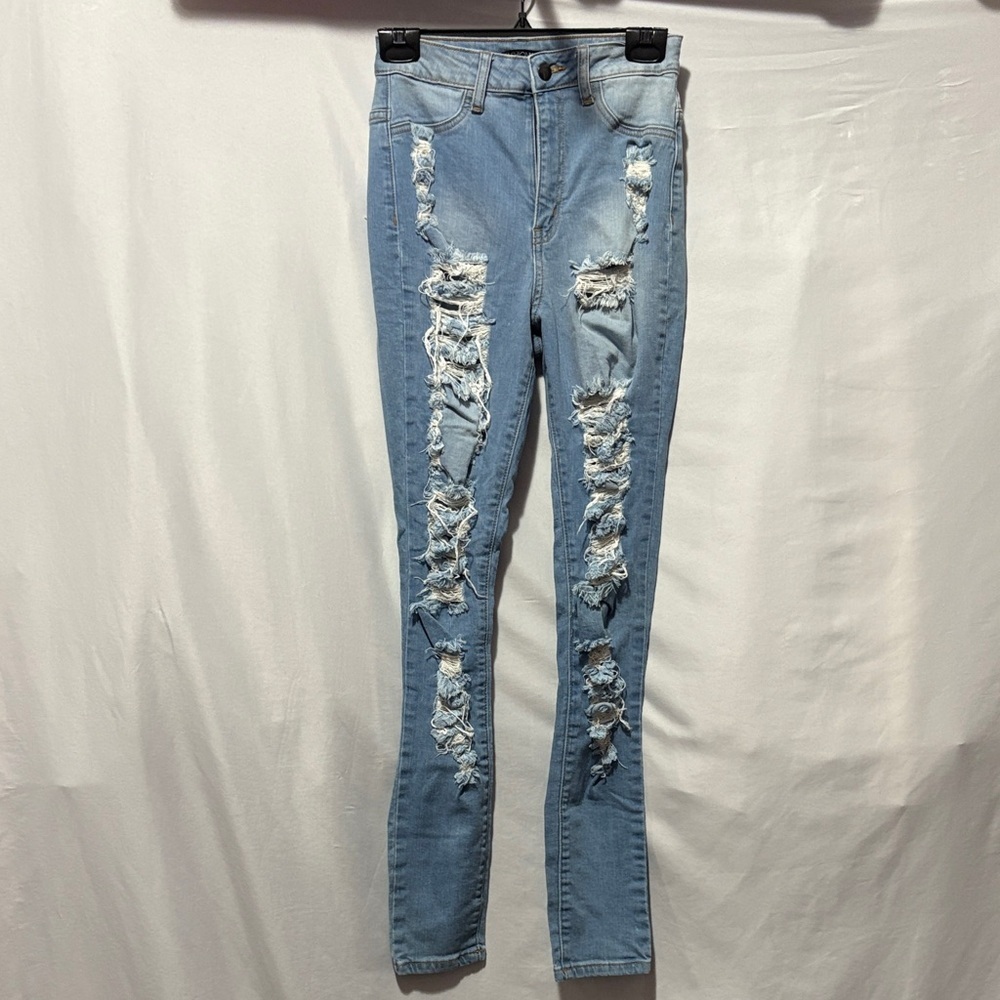 Fashion Nova Light Blue Distressed Skinny Jeans